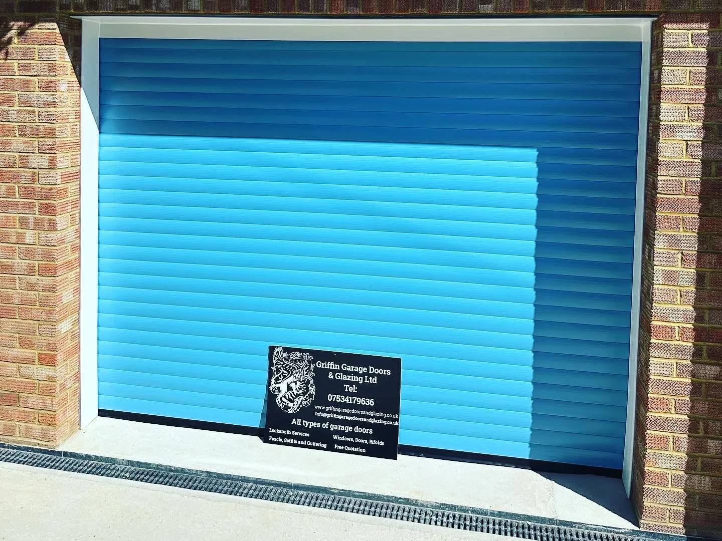 bright blue stand alone garage door