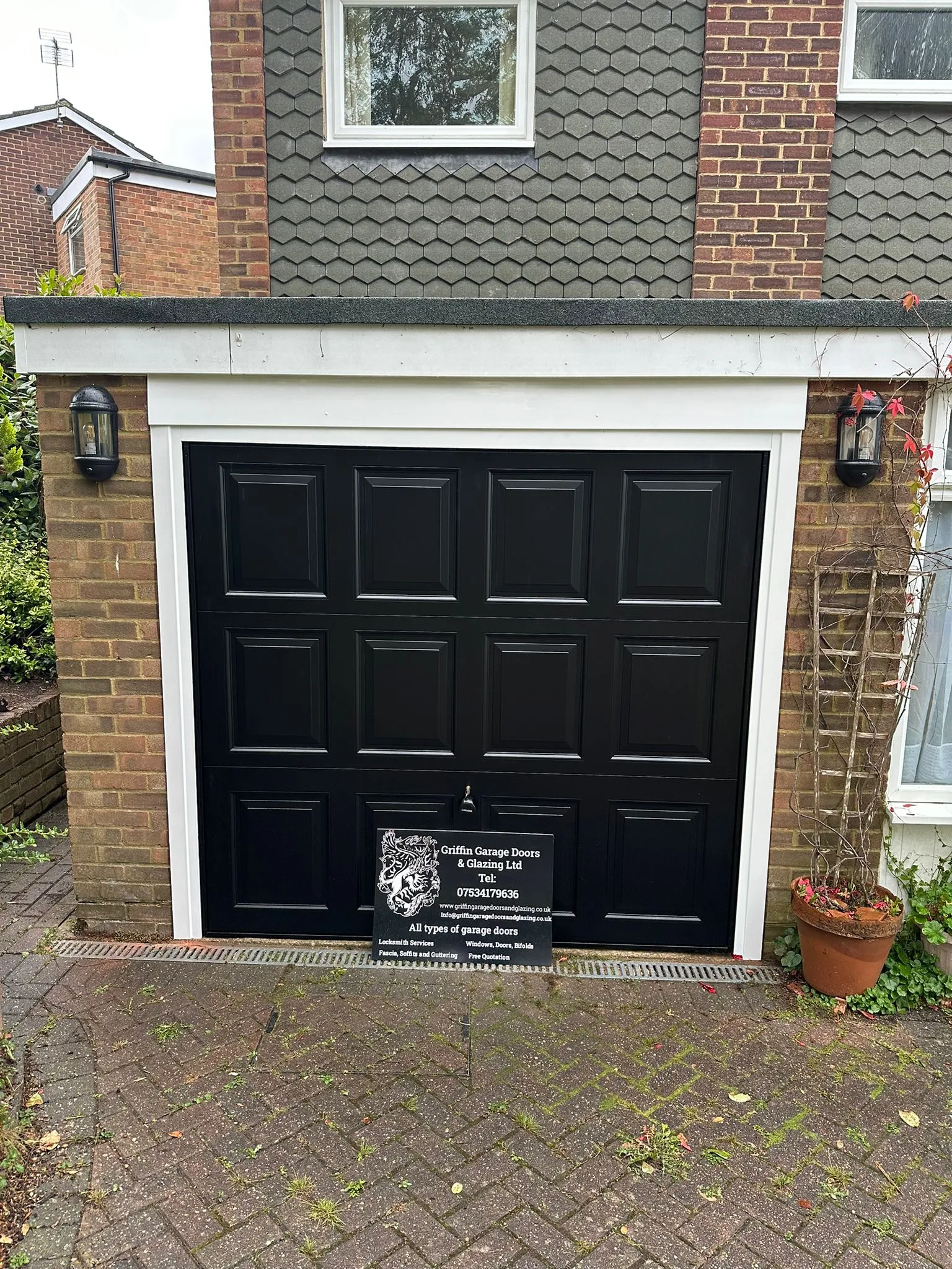 black garage door with picture