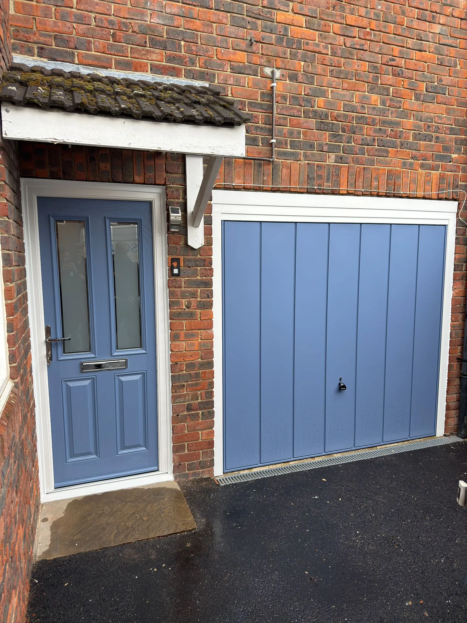 light blue garage door and front door